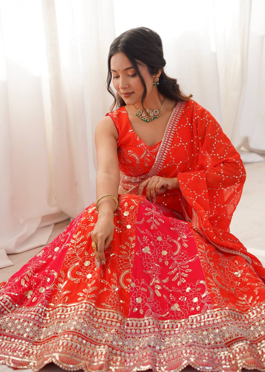 Coral Red Embroidered Faux Georgette Lehenga Choli with Dupatta