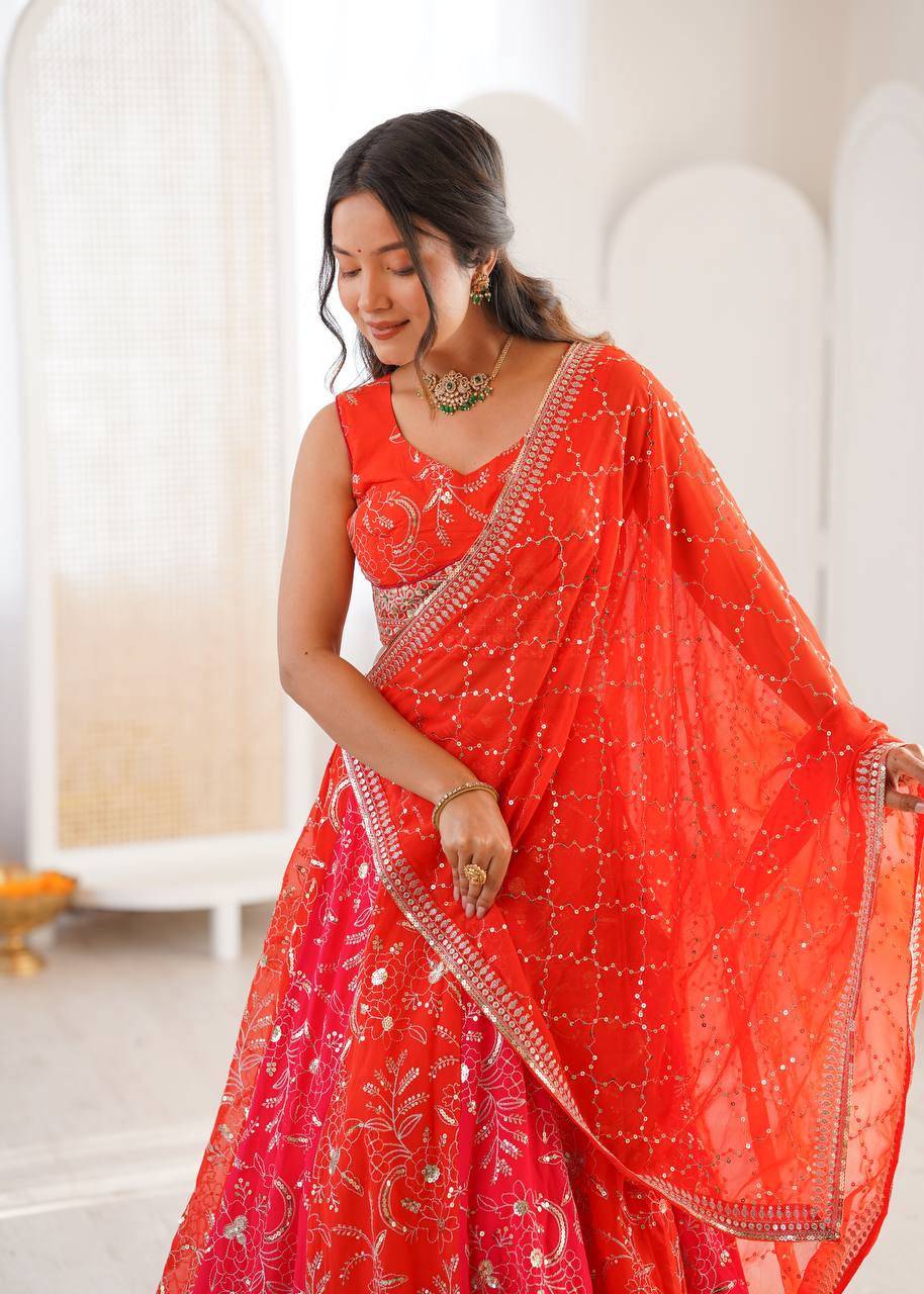 Coral Red Embroidered Faux Georgette Lehenga Choli with Dupatta