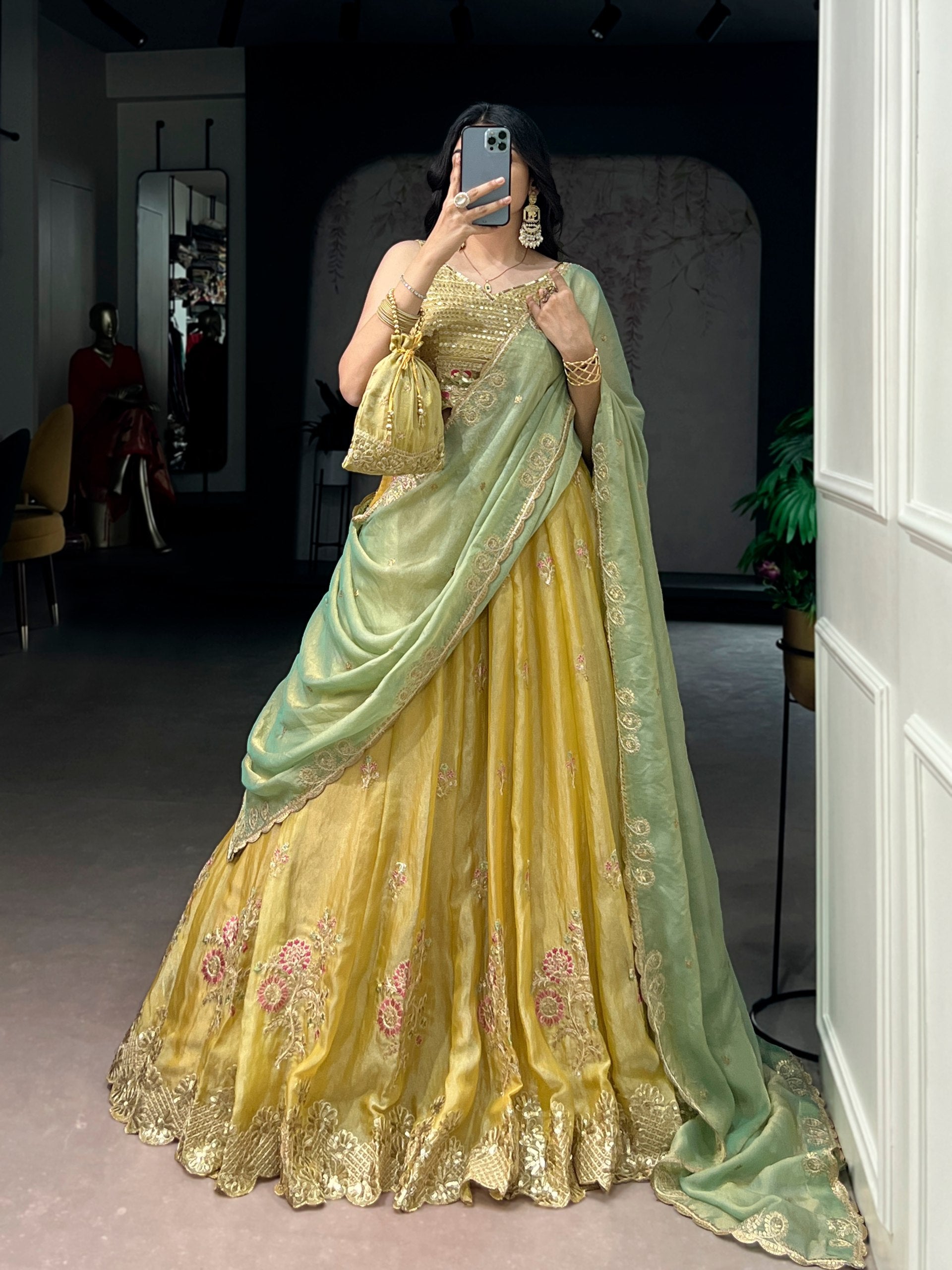 Yellow NC Moss Silk Designer Lehenga Choli with Embroidered Dupatta & Matching Batwa Bag
