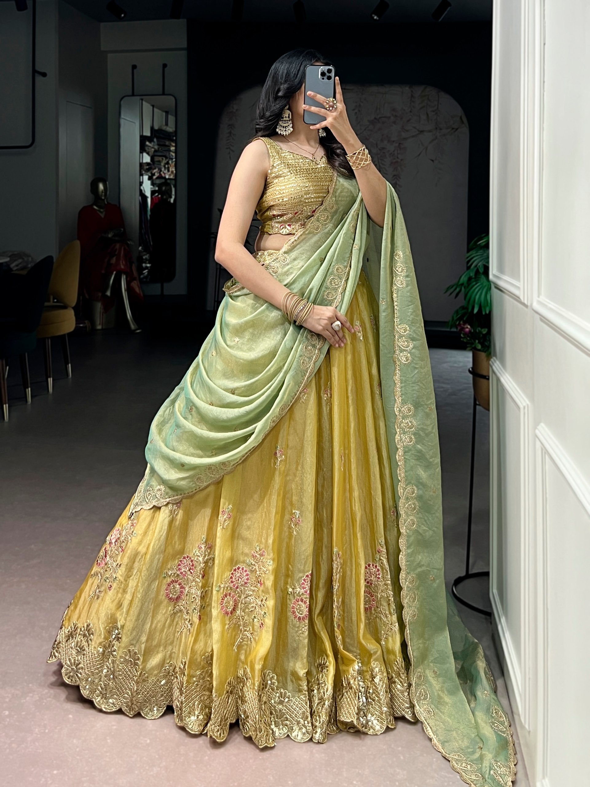 Yellow NC Moss Silk Designer Lehenga Choli with Embroidered Dupatta & Matching Batwa Bag