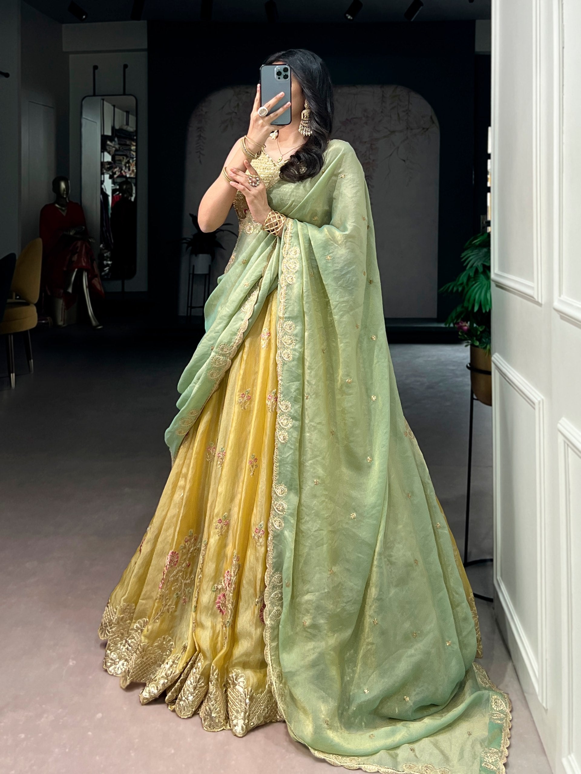 Yellow NC Moss Silk Designer Lehenga Choli with Embroidered Dupatta & Matching Batwa Bag