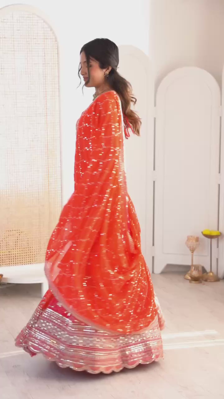 Coral Red Embroidered Faux Georgette Lehenga Choli with Dupatta